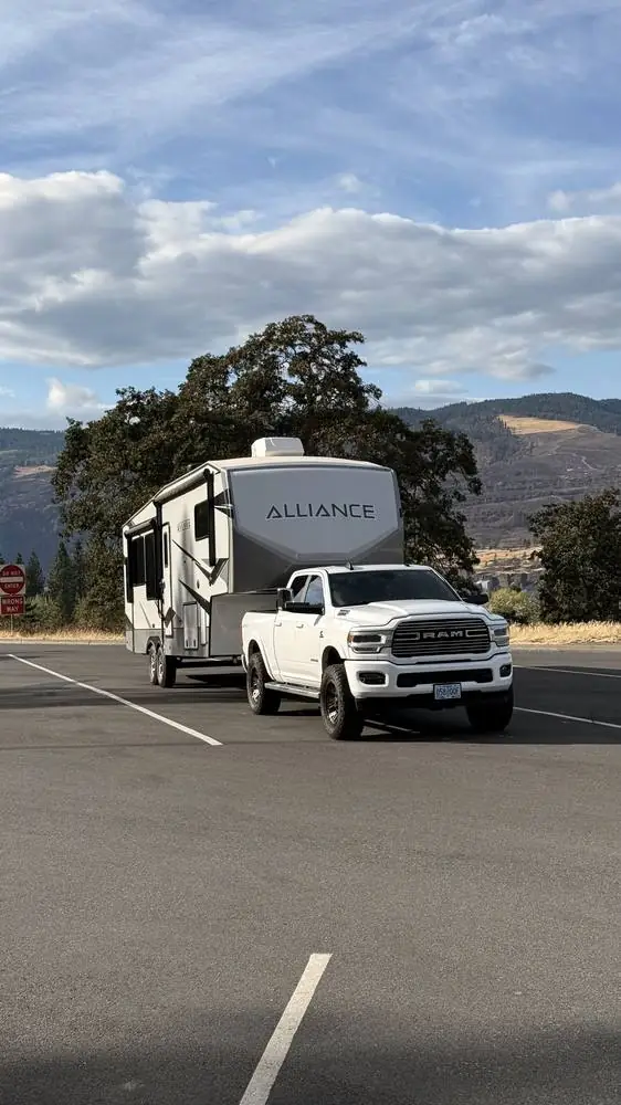 Ram 2500 towing the fifth wheel down the highway